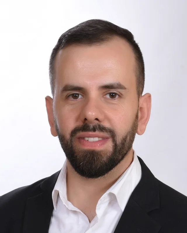 Dr. Ali J. Ghandour